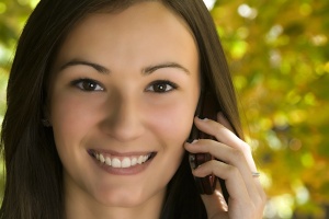 Close up on a Beautiful Girl Talking on a Cell Phone
